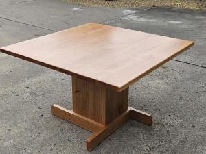 Square cherry table on a wood pedestal base by Four Fields Furniture, Minneapolis–St. Paul