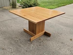 Square cherry pedestal table with cross-foot base, handmade in Minneapolis–St. Paul